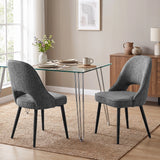 [Grey | Set of 4] Pair of fabric dining room chairs at a glass table, showing curved open backs and black metal legs
