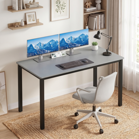 [120 X 50 cm] Computer Desk styled in a sunlit room with dual monitors, keyboard, anglepoise lamp, succulent, white swivel chair, and floating shelves