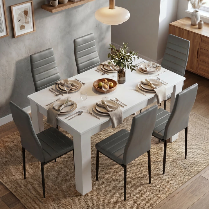 [6 Seater | Grey] Dining Table and Chairs Set viewed from above in a styled dining room with six grey chairs, place settings, and a fruit bowl centrepiece
