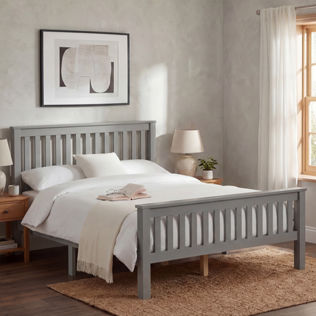 Grey double bed frame in solid wood, positioned centrally with bedding and matching bedside furniture in a bedroom layout