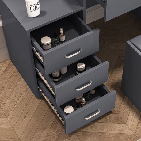 Grey dressing table with drawer, mirror, and lights for a stylish and functional setup.