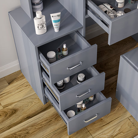 Grey dressing table with grey drawers and mirror for a sleek and functional vanity setup.