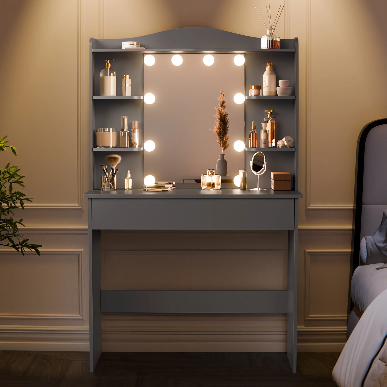 [Grey]  Front view of grey dressing table with mirror and storage shelves neatly arranged with cosmetics and decor items