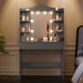 Grey dressing table with mirror and LED lights, featuring 5 side shelves and 1 large drawer, ideal for bedroom vanity setups. DHS makeup vanity desk with adjustable lighting and ample storage.
