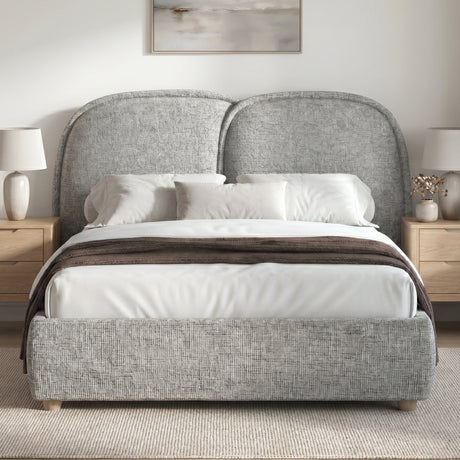 [King | Grey] Embracea upholstered bed in front-facing lifestyle view with matching oak bedside tables and layered bedding