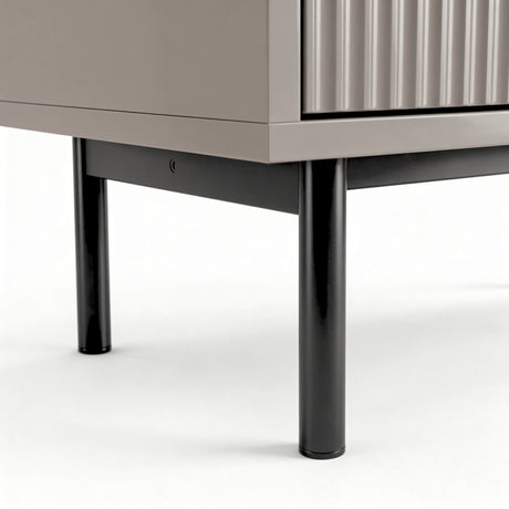 [Grey] Flutrina base detail showing four slim matte black metal legs with structural support rail
 