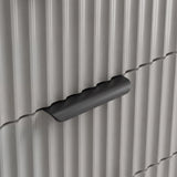 Close detail of grey flutrina drawer front with sleek metal pull handle of the six chest of drawers