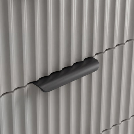 Close detail of grey flutrina drawer front with sleek metal pull handle of the six chest of drawers