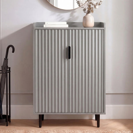 [Grey | 60cm] Flutrina shoe cabinet at an angle in a hallway corner with umbrella stand, herringbone flooring beneath