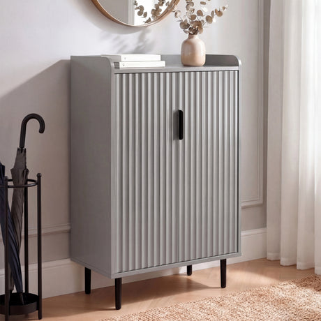 [Grey | 60cm] Flutrina shoe cabinet in a hallway with doors closed, umbrella stand beside it, round mirror and vase above