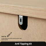 [Grey] Haven chest detail showing the steel anti-tip bracket hardware mounted beneath the solid oak top edge