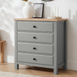 [Grey] Haven 4 drawer chest with oak top and black knobs at a three-quarter angle, styled with dried botanicals and candles