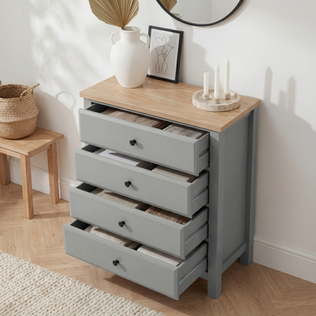 [Grey] 4 drawer chest with oak top, drawers open showing storage, styled with vase and decor in modern room.