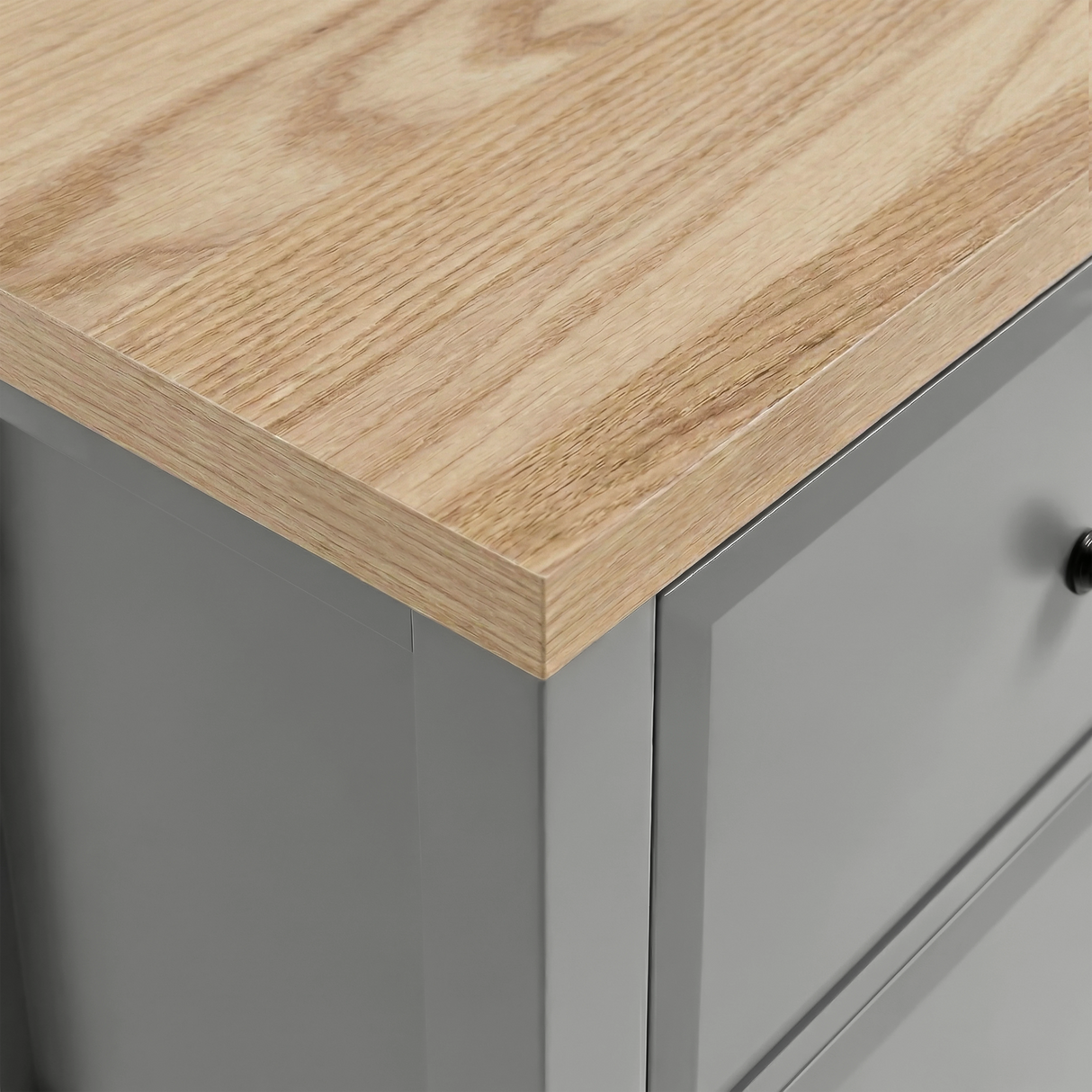 [Grey] Haven close-up of natural oak top showing wood grain texture against light grey painted body