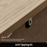 [Grey] Haven anti-tipping kit detail showing wall bracket behind oak-effect top and safety message