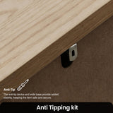 [Grey] Haven anti-tipping kit detail showing wall bracket behind oak-effect top and safety message