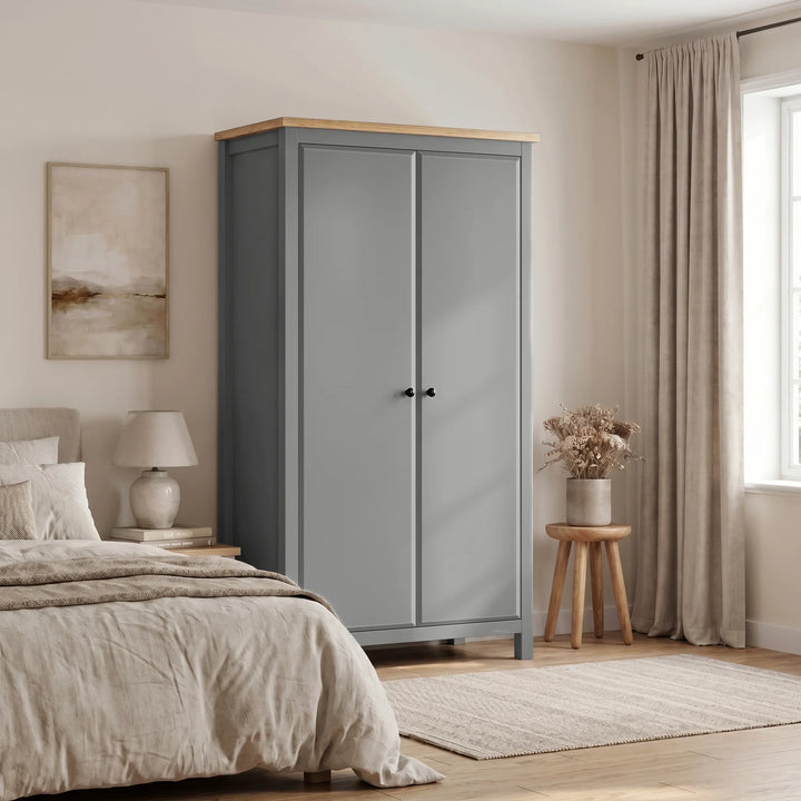 [Grey] Haven Grey 2 Door Double Wardrobe with Shelves and Hanging Rail styled beautifully within a modern neutral bedroom.