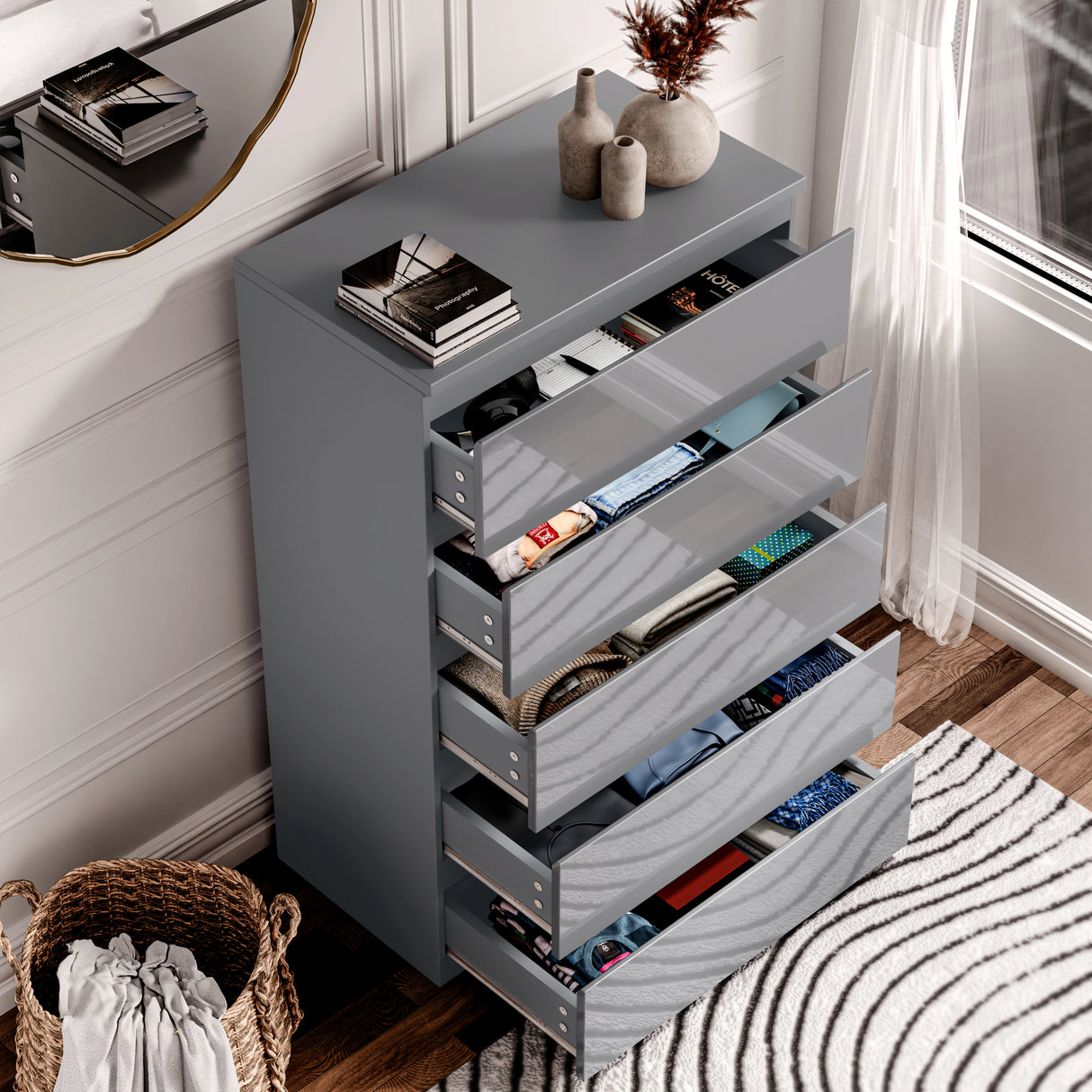 Open drawers of grey high gloss chest filled with clothes and accessories, from the 3 Piece Bedroom Set for stylish bedroom storage.