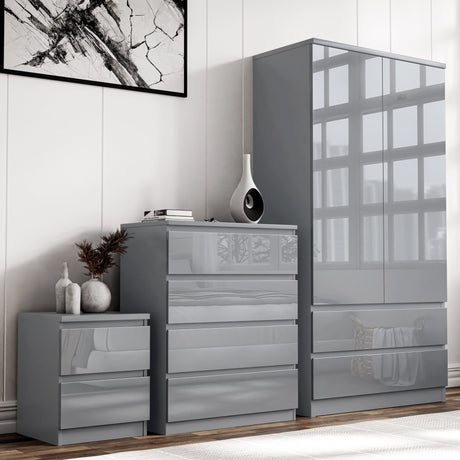 Grey High Gloss 3 Piece Wardrobe Set With Chest of Drawers including wardrobe, chest, and bedside table in a modern bedroom.