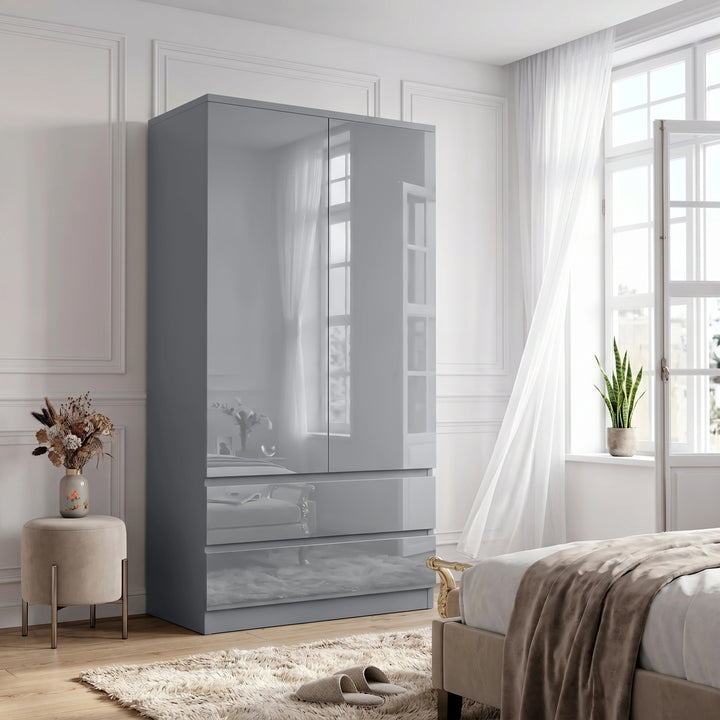[Grey] High gloss wardrobe in bedroom with closed doors, lower drawers, window reflections, curtains, bed, plant, and rug.