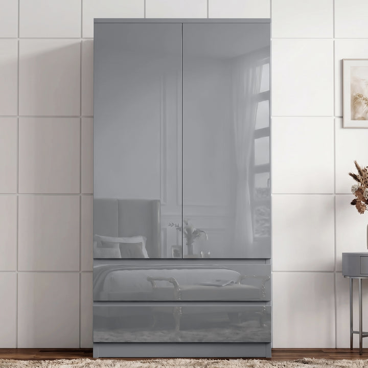 [Grey] High gloss wardrobe straight front view with closed doors, lower drawers, reflective panels, wall art, vase, and rug.