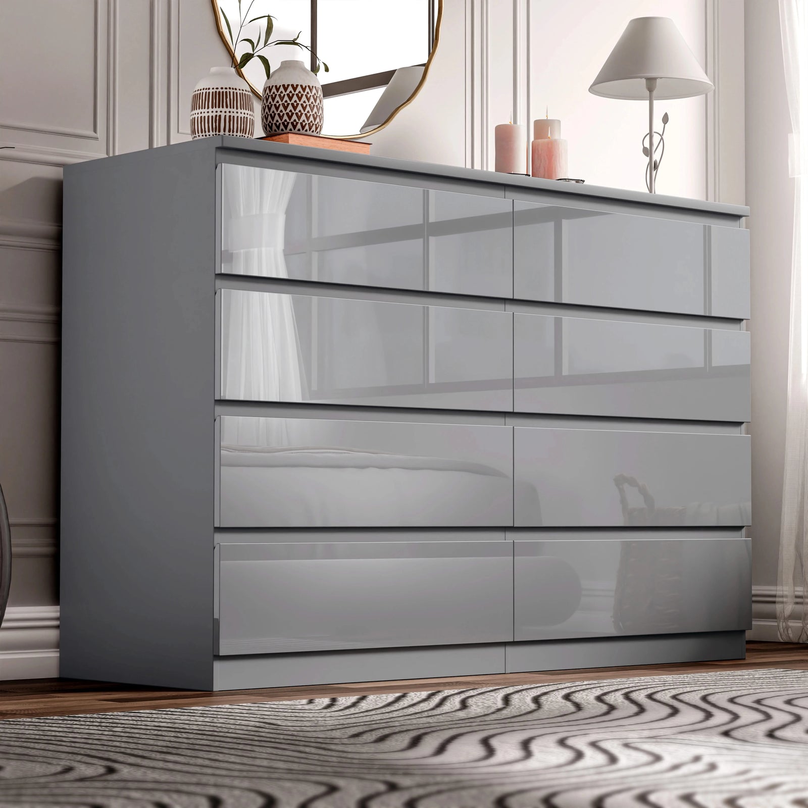 [Grey] high gloss wide chest of drawers in bedroom corner with lamp glowing and candles on top