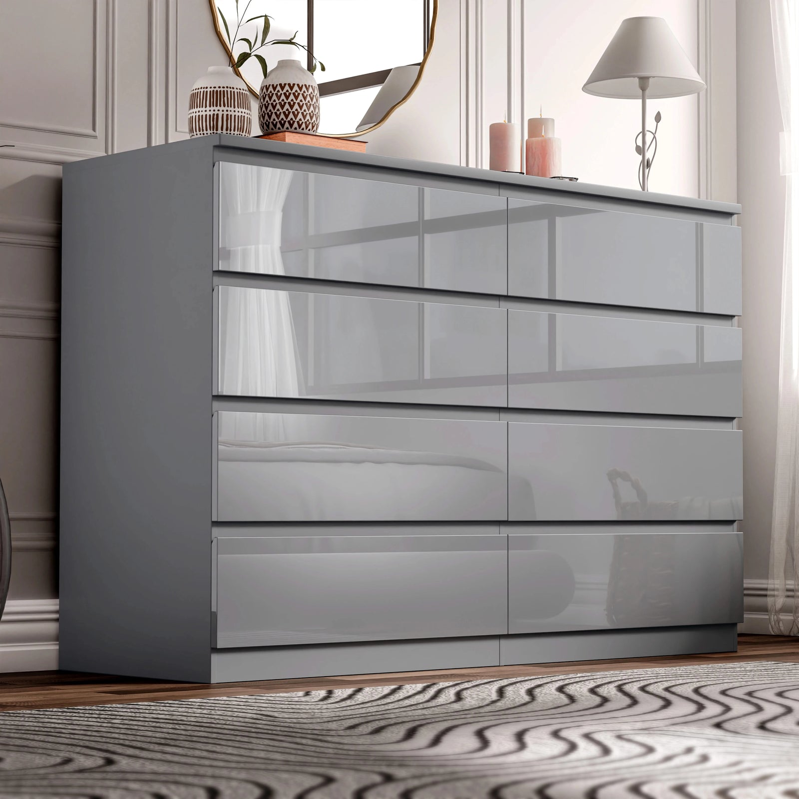 [Grey] high gloss wide chest of drawers in bedroom corner with lamp glowing and candles on top