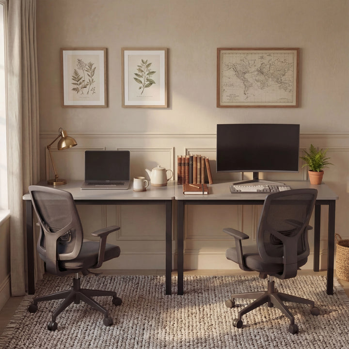 [80 X 50 cm] Home Office Desk arranged as dual workstation in a beige room with botanical art, world map, mesh chairs, laptop, and curved monitor