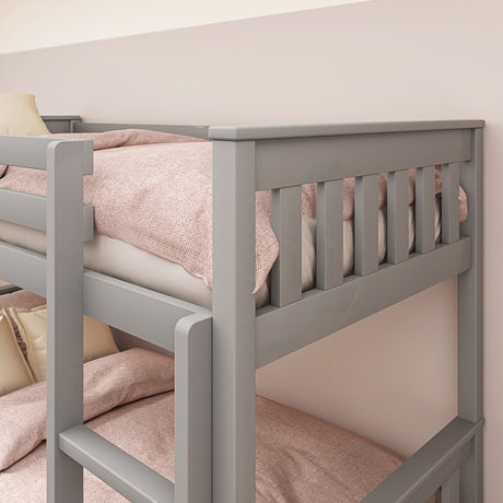 Grey kids bunk beds with quilt, offering comfort and style for your child's room.
