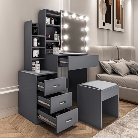 Gray vanity with mirror and lights in a room with a sofa and decor.