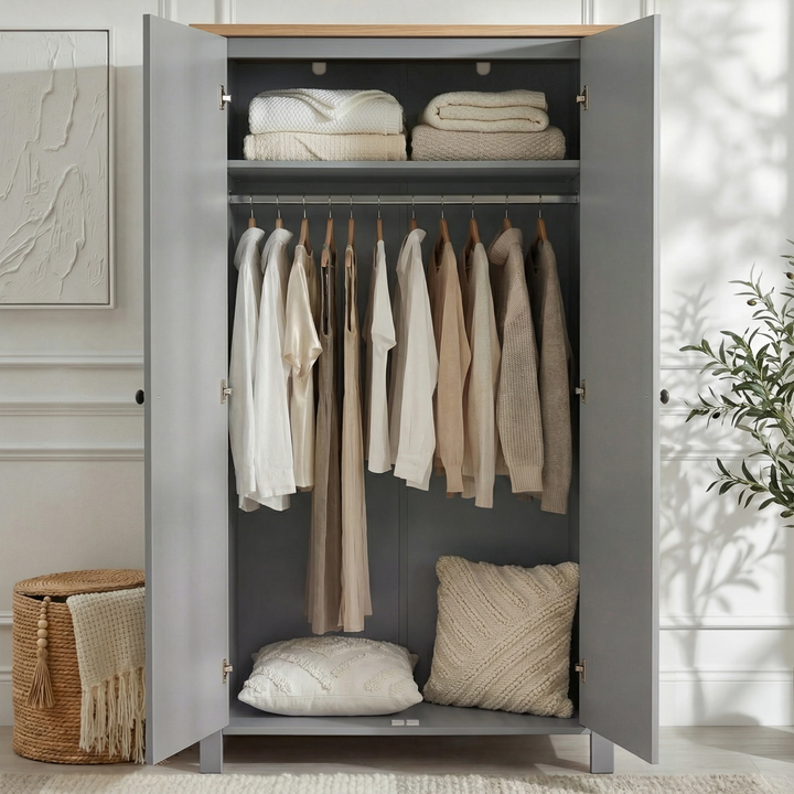 [Grey] Linra 2 door wardrobe open, upper shelf with folded linens, hanging rail with garments, cushions on floor