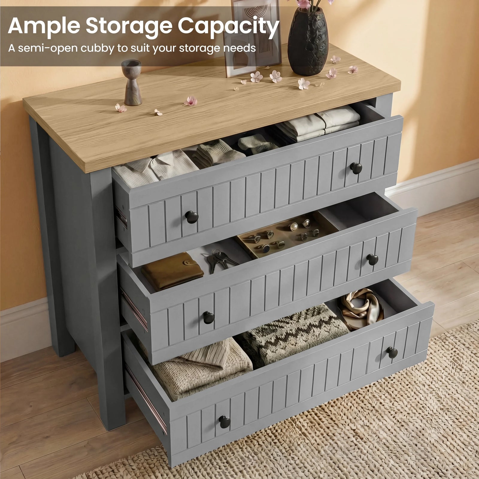 [Grey] Storage detail Linra bedroom furniture set chest, three open drawers with neutral textiles