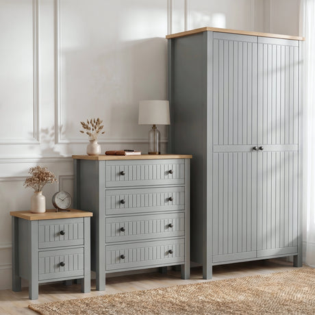 [Grey] Linra bedroom furniture set in grey with oak top, wardrobe, 4 drawer chest and 2 drawer bedside in styled room