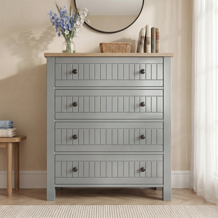 [Grey] Linra Painted 4 Piece Bedroom Furniture Set Grey four-drawer chest front view with tongue-and-groove fronts, paired black knobs, oak top, blue flowers, and round mirror