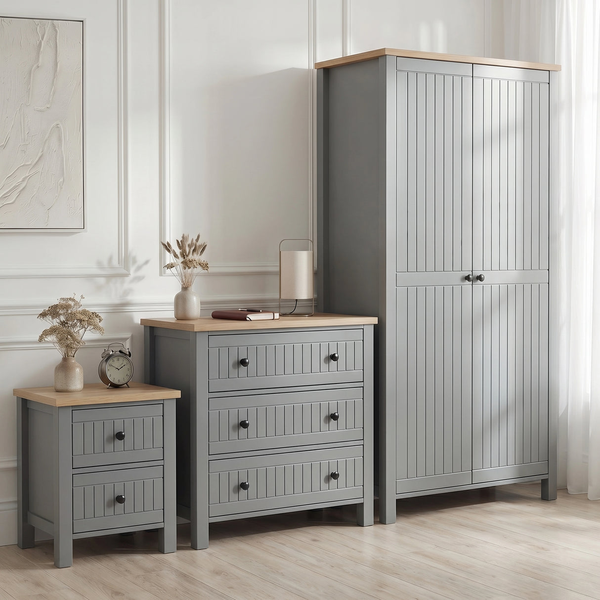 [Grey] Linra bedroom furniture set styled in panelled bedroom with grey wardrobe, 3 drawer chest and bedside