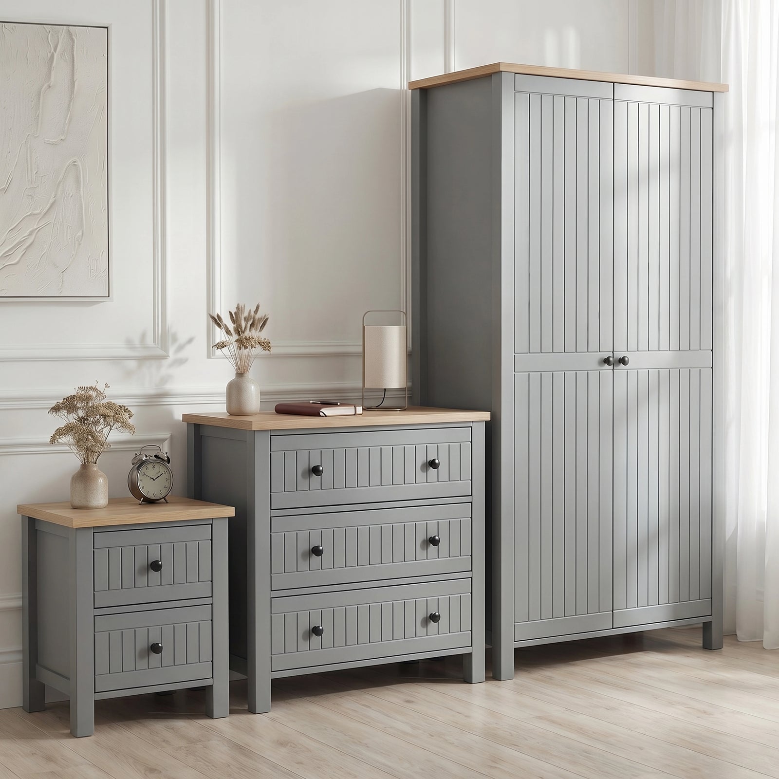 [Grey] Linra bedroom furniture set styled in panelled bedroom with grey wardrobe, 3 drawer chest and bedside