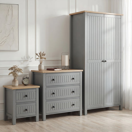 [Grey] Linra bedroom furniture set styled in panelled bedroom with grey wardrobe, 3 drawer chest and bedside