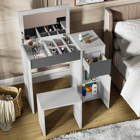Modern makeup dressing table with flip-up mirror, multiple storage sections, and matching stool in white and grey finish, ideal for bedroom vanities.