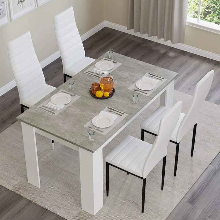 [4 Seater | White] Top view: grey marble 120cm table, 4 white chairs, plates, orange bowl