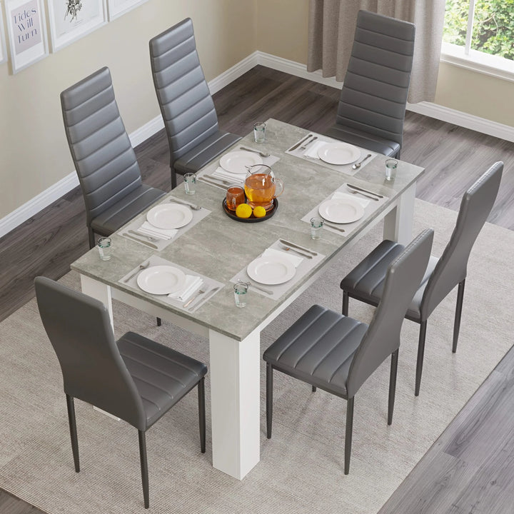 [6 Seater | Grey] Overhead: 6 grey chairs at grey marble 140cm table, plates, fruit bowl