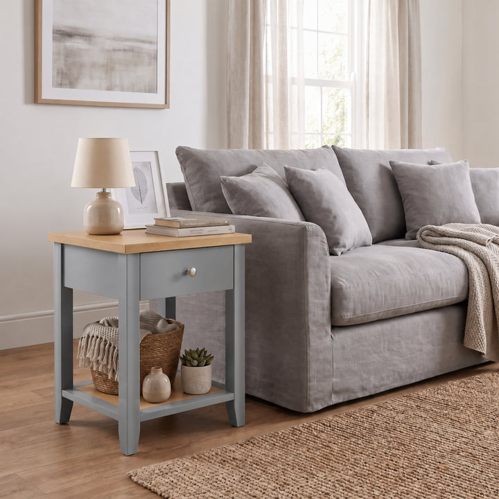[Grey] Grey Shaker Bedside Table styled as an end table beside a modern grey sofa.