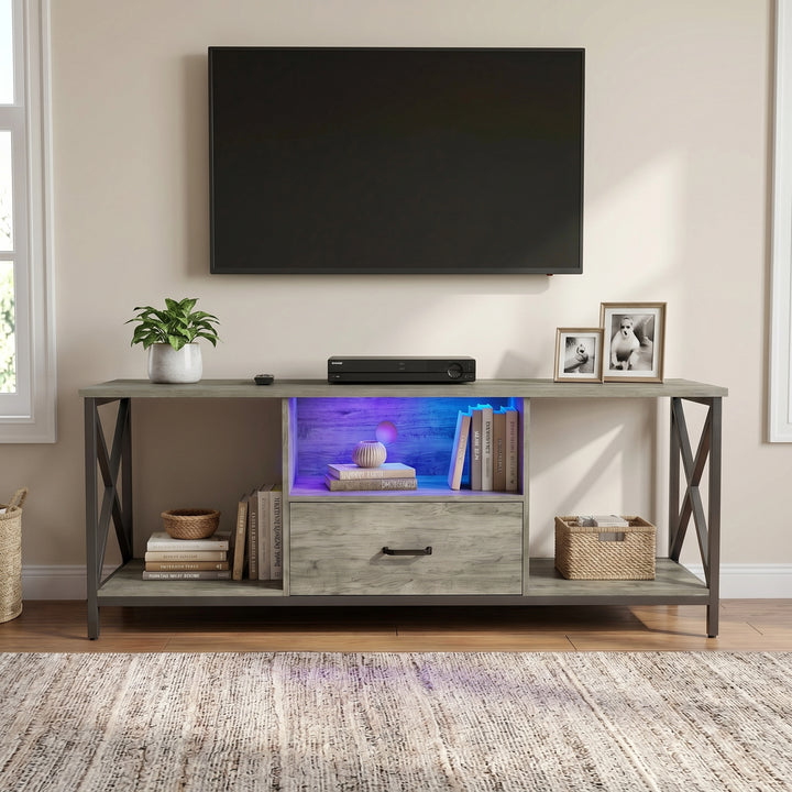 [Grey Oak] Calvera TV unit beneath black pendant lamp with pampas in tall vase on the left and central drawer closed