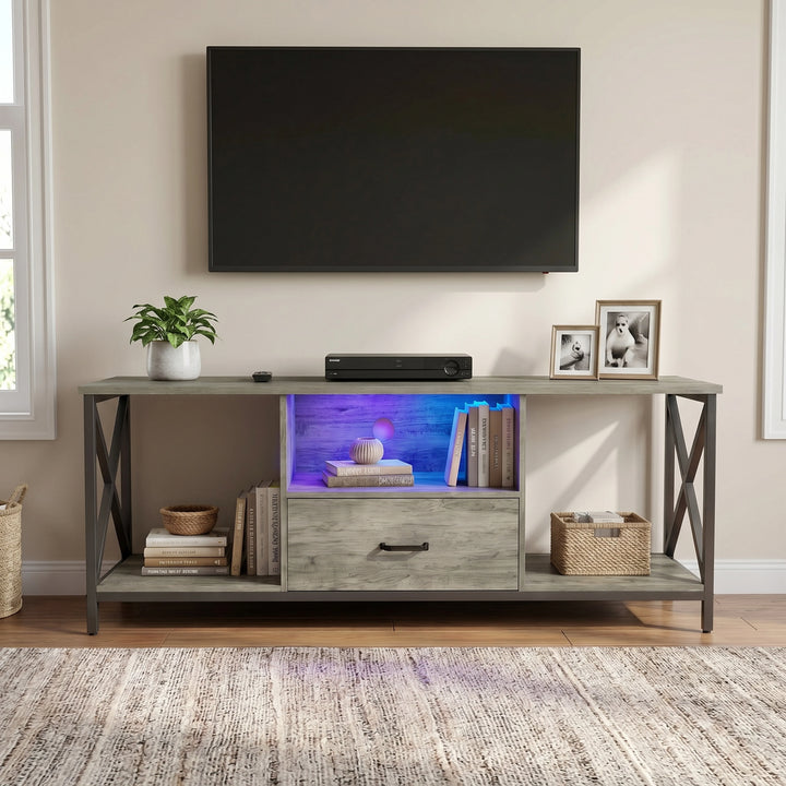 [Grey Oak] Calvera TV unit beneath black pendant lamp with pampas in tall vase on the left and central drawer closed