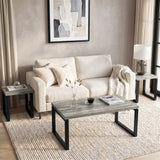[Grey Oak] Nestline coffee table styled in a calm living room with beige chairs, framed art, and rug