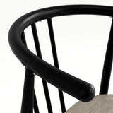 [Grey Oak] Torvi chair curved matte black metal backrest and armrest detail with rounded end cap close-up