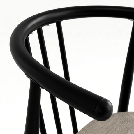 [Grey Oak] Torvi chair curved matte black metal backrest and armrest detail with rounded end cap close-up