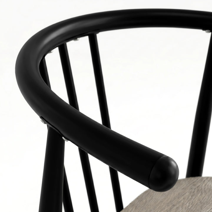 [Grey Oak] Torvi chair curved matte black metal backrest and armrest detail with rounded end cap close-up