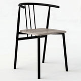 [Grey] Torvi dining chair with black tubular metal frame, spindle back, armrests and grey oak seat pad