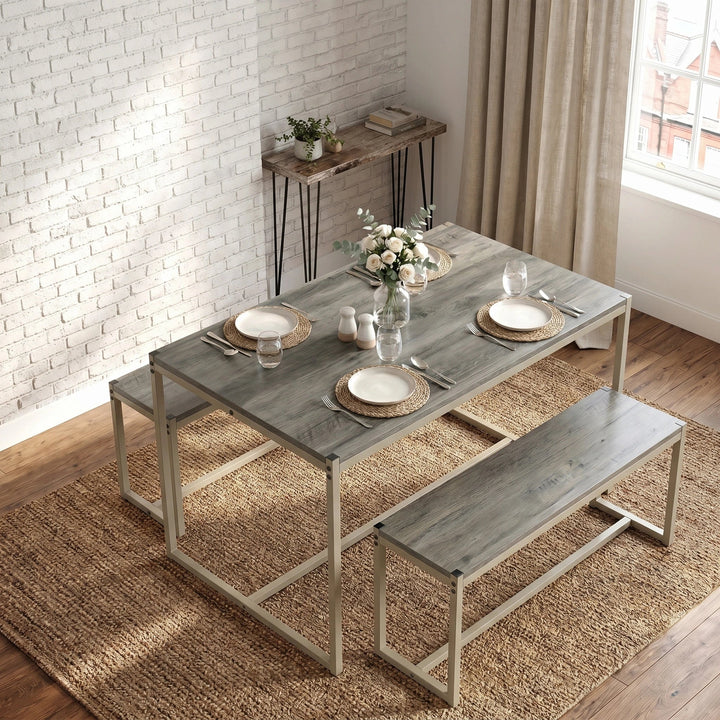 [Grey] Orvak Grey 4 Seater Dining Table With Bench Set styled in a rustic dining room with woven placemats, white roses, and salt and pepper shakers on a jute rug
