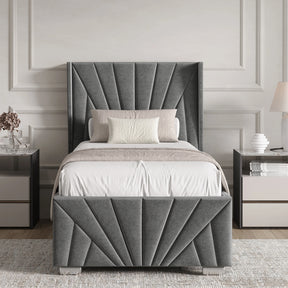 Grey upholstered bed with tufted design in a bedroom setting.